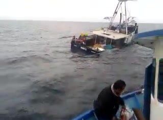 a Watch this fishing vessel sinking