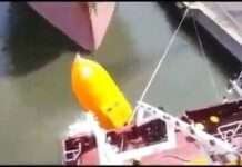  a Lifeboat Launching Gone Wrong with Three Persons Inside