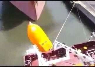 a Lifeboat Launching Gone Wrong with Three Persons Inside a Lifeboat Launching Gone Wrong with Three Persons Inside