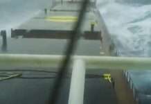 a Merchant ship struggling against the storm a Merchant ship struggling against the storm