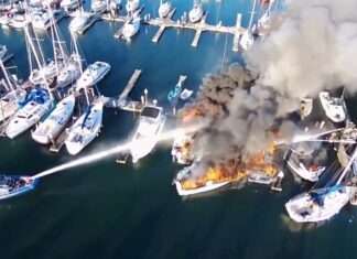 FIRE BOAT BURNING IN THE PORT FIRE BOAT BURNING IN THE PORT