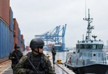 Realistic editorial photo style image of a Brazilian Navy security exercise at a commercial port: soldiers in tactical g…